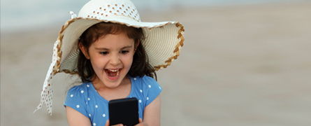 Little girl taking a selfie